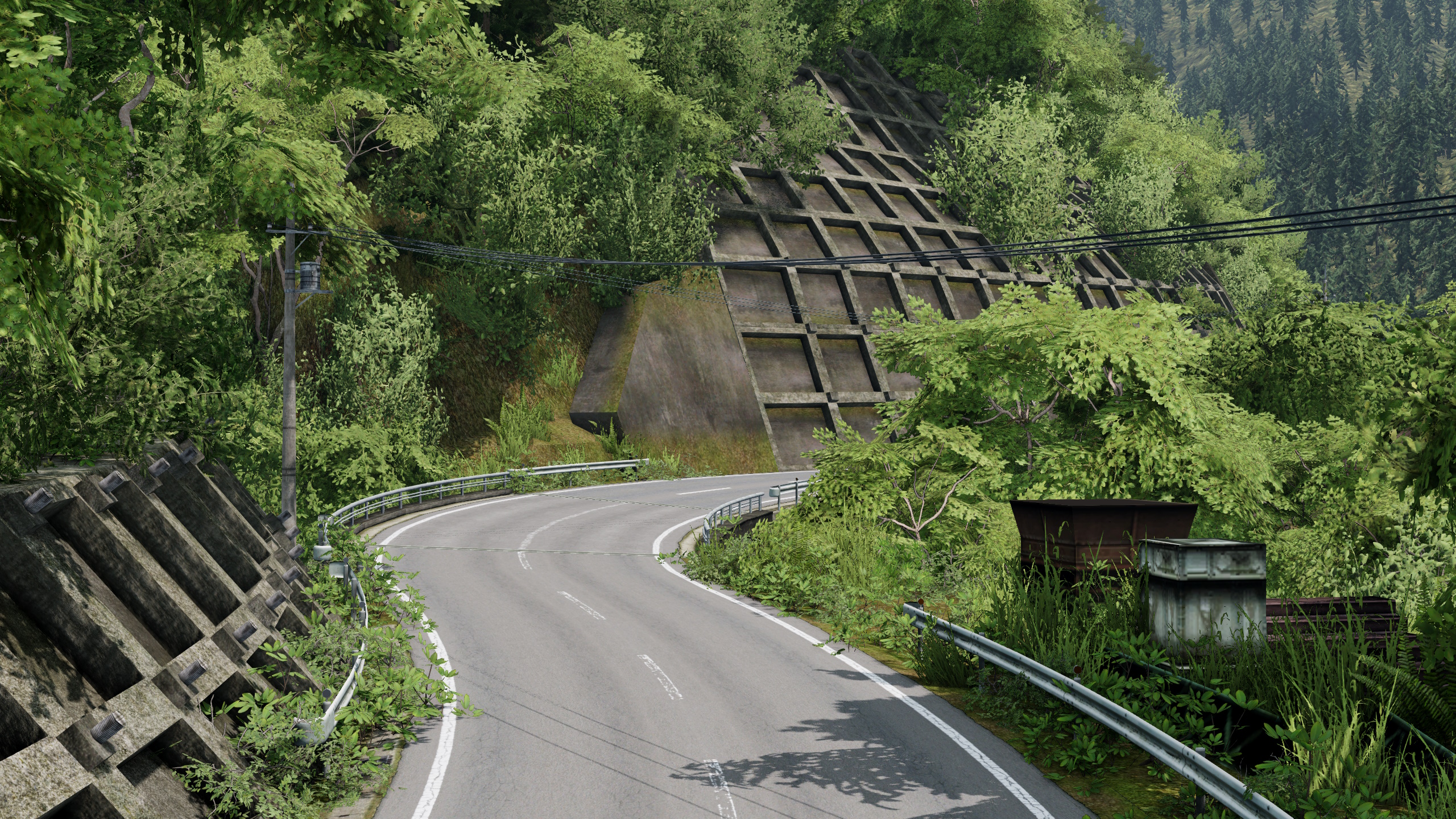 Two cars racing a mountain road at dusk
